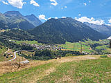 Blick auf Curaglia und ins Val Medel, Juli 2026